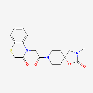 molecular formula C18H21N3O4S B5639869 4-[2-(3-methyl-2-oxo-1-oxa-3,8-diazaspiro[4.5]dec-8-yl)-2-oxoethyl]-2H-1,4-benzothiazin-3(4H)-one 