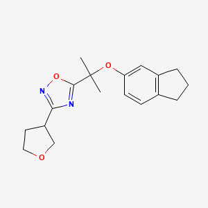 molecular formula C18H22N2O3 B5649861 5-[1-(2,3-dihydro-1H-inden-5-yloxy)-1-methylethyl]-3-(tetrahydrofuran-3-yl)-1,2,4-oxadiazole 