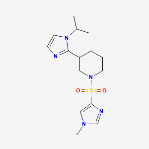 molecular formula C15H23N5O2S B5653450 3-(1-isopropyl-1H-imidazol-2-yl)-1-[(1-methyl-1H-imidazol-4-yl)sulfonyl]piperidine 