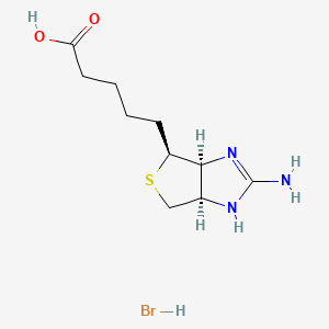 molecular formula C10H18BrN3O2S B565887 Guanidinobiotin CAS No. 76985-52-9