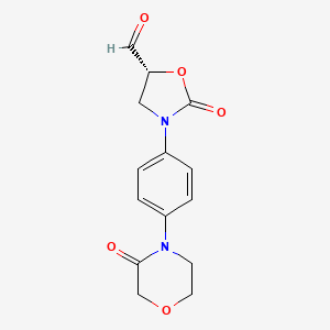 molecular formula C14H14N2O5 B565899 (5R)-2-Oxo-3-[4-(3-oxomorpholin-4-yl)phenyl]-1,3-oxazolidine-5-carbaldehyde CAS No. 1160170-03-5