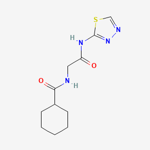 molecular formula C11H16N4O2S B5662058 N-[2-oxo-2-(1,3,4-thiadiazol-2-ylamino)ethyl]cyclohexanecarboxamide 