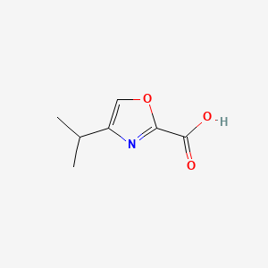 molecular formula C7H9NO3 B566284 4-Isopropyloxazole-2-carboxylic acid CAS No. 1187172-65-1