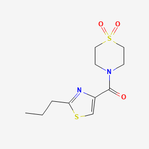 molecular formula C11H16N2O3S2 B5663217 4-[(2-propyl-1,3-thiazol-4-yl)carbonyl]thiomorpholine 1,1-dioxide 