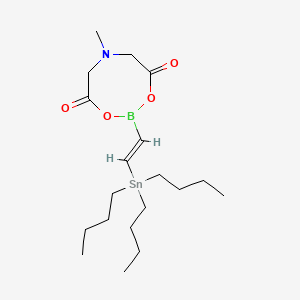 molecular formula C19H36BNO4Sn B566791 trans-2-(Tributyltin)vinylboronic acid MIDA ester CAS No. 1237789-30-8
