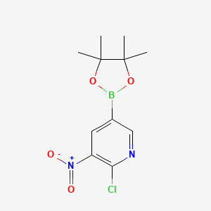 molecular formula C11H14BClN2O4 B566973 2-Chloro-3-nitro-5-(4,4,5,5-tetramethyl-1,3,2-dioxaborolan-2-YL)pyridine CAS No. 1310383-11-9