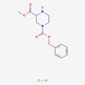 molecular formula C14H19ClN2O4 B567540 1-苄基3-甲基哌嗪-1,3-二羧酸盐酸盐 CAS No. 1219153-60-2