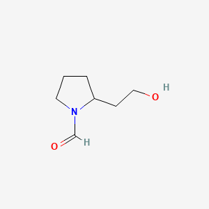 molecular formula C7H13NO2 B568213 2-(2-Hydroxyethyl)pyrrolidine-1-carbaldehyde CAS No. 115666-63-2