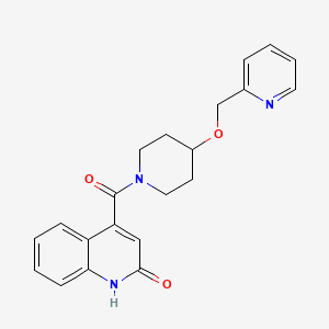 molecular formula C21H21N3O3 B5685221 4-{[4-(2-pyridinylmethoxy)-1-piperidinyl]carbonyl}-2(1H)-quinolinone 