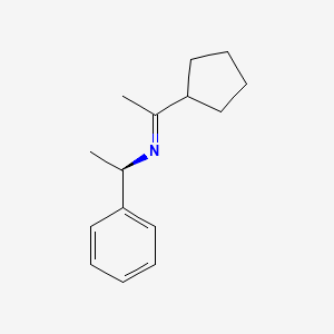molecular formula C15H23N B568847 1-cyclopentyl-N-[(1R)-1-phenylethyl]ethanimine CAS No. 1312949-69-1