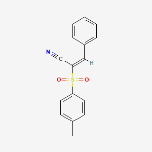 molecular formula C16H13NO2S B5688981 2-[(4-methylphenyl)sulfonyl]-3-phenylacrylonitrile 