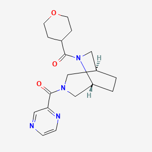 molecular formula C18H24N4O3 B5690593 (1S*,5R*)-3-(2-pyrazinylcarbonyl)-6-(tetrahydro-2H-pyran-4-ylcarbonyl)-3,6-diazabicyclo[3.2.2]nonane 
