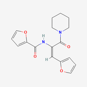 molecular formula C17H18N2O4 B5690849 N-[2-(2-furyl)-1-(1-piperidinylcarbonyl)vinyl]-2-furamide 
