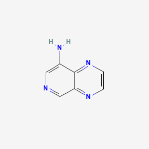 molecular formula C7H6N4 B569385 吡啶并[3,4-b]吡嗪-8-胺 CAS No. 120208-34-6