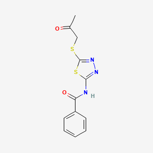 molecular formula C12H11N3O2S2 B5700598 N-{5-[(2-oxopropyl)thio]-1,3,4-thiadiazol-2-yl}benzamide 