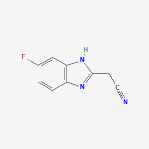 molecular formula C9H6FN3 B571022 2-(5-Fluoro-1H-benzo[d]imidazol-2-yl)acetonitrile CAS No. 115201-20-2