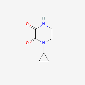 molecular formula C7H10N2O2 B571197 1-Cyclopropylpiperazine-2,3-dione CAS No. 120436-04-6