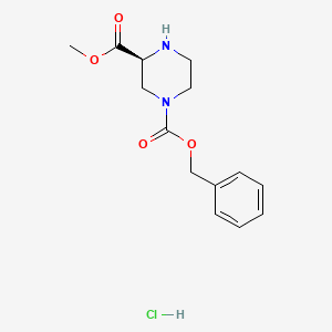 molecular formula C14H19ClN2O4 B571940 (S)-1-苄基 3-甲基哌嗪-1,3-二羧酸盐盐酸盐 CAS No. 1217471-97-0
