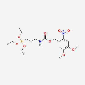 molecular formula C19H32N2O9Si B573608 Nitroveratryloxycarbonylamidopropyltriethoxysilane,10per cent in tetrahydrofuran CAS No. 188541-09-5