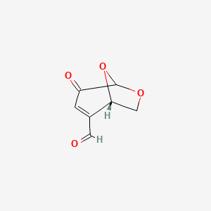 molecular formula C7H6O4 B574652 (1S)-4-oxo-6,8-dioxabicyclo[3.2.1]oct-2-ene-2-carbaldehyde CAS No. 176912-65-5
