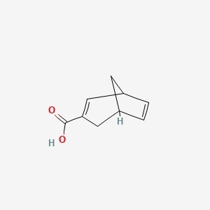 molecular formula C9H10O2 B576509 Bicyclo[3.2.1]octa-2,6-diene-3-carboxylic acid CAS No. 10497-57-1