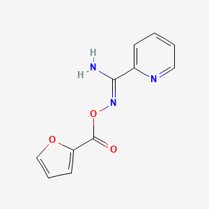 molecular formula C11H9N3O3 B5774243 N'-(2-furoyloxy)-2-pyridinecarboximidamide 