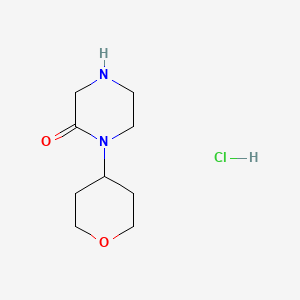 molecular formula C9H17ClN2O2 B577542 1-(Tetrahydro-2H-pyran-4-yl)piperazin-2-one hydrochloride CAS No. 1284244-13-8