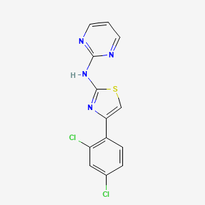 molecular formula C13H8Cl2N4S B5784378 N-[4-(2,4-dichlorophenyl)-1,3-thiazol-2-yl]-2-pyrimidinamine 