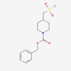 molecular formula C14H18ClNO4S B580025 4-((氯磺酰基)甲基)哌啶-1-羧酸苄酯 CAS No. 1211587-42-6