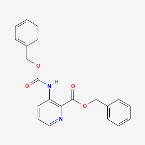 molecular formula C21H18N2O4 B581490 Benzyl 3-(((benzyloxy)carbonyl)amino)picolinate CAS No. 1228956-95-3