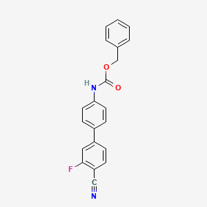 molecular formula C21H15FN2O2 B581724 苯甲酸苄酯 N-[4-(4-氰基-3-氟苯基)苯基] CAS No. 1381944-75-7