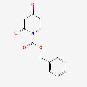 molecular formula C13H13NO4 B582539 Benzyl 2,4-dioxopiperidine-1-carboxylate CAS No. 1246303-70-7