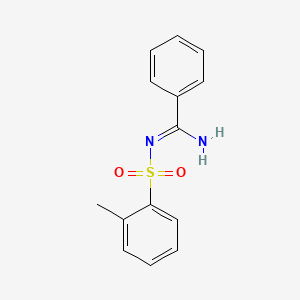 molecular formula C14H14N2O2S B5842496 N'-[(2-methylphenyl)sulfonyl]benzenecarboximidamide 