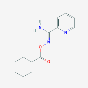 molecular formula C13H17N3O2 B5848112 N'-[(cyclohexylcarbonyl)oxy]-2-pyridinecarboximidamide 