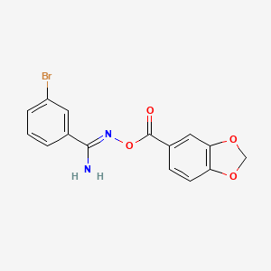 molecular formula C15H11BrN2O4 B5850281 N'-[(1,3-benzodioxol-5-ylcarbonyl)oxy]-3-bromobenzenecarboximidamide 