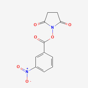 molecular formula C11H8N2O6 B5856746 1-[(3-nitrobenzoyl)oxy]-2,5-pyrrolidinedione 