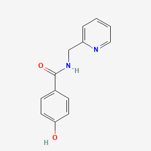 molecular formula C13H12N2O2 B5868273 4-hydroxy-N-(2-pyridinylmethyl)benzamide 