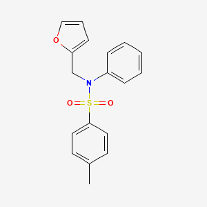 molecular formula C18H17NO3S B5889640 N-(2-furylmethyl)-4-methyl-N-phenylbenzenesulfonamide 
