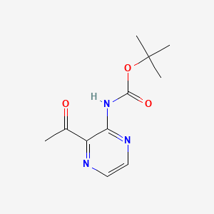 molecular formula C11H15N3O3 B592132 叔丁基(3-乙酰基吡嗪-2-基)氨基甲酸酯 CAS No. 1799412-29-5