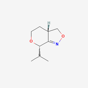 B592380 (3aS,7S)-7-Isopropyl-3,3a,4,5-tetrahydro-7H-pyrano[3,4-c][1,2]oxazole CAS No. 136968-84-8