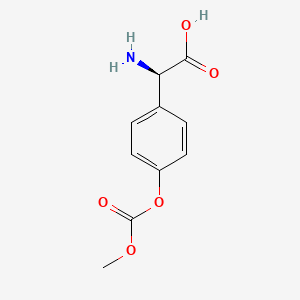 molecular formula C10H11NO5 B592490 (2R)-2-Amino-2-(4-methoxycarbonyloxyphenyl)acetic acid CAS No. 1246973-57-8