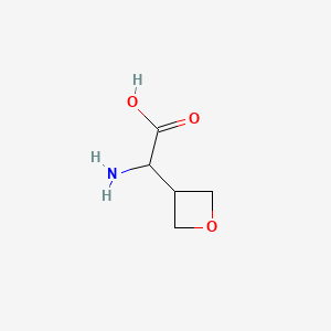 molecular formula C5H9NO3 B594783 Acide 2-amino-2-(oxétane-3-YL)acétique CAS No. 1270019-87-8