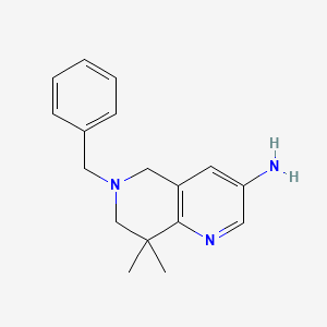 B596147 6-Benzyl-8,8-dimethyl-5,6,7,8-tetrahydro-1,6-naphthyridin-3-amine CAS No. 1356087-44-9