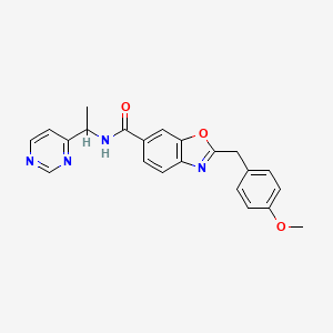molecular formula C22H20N4O3 B5963368 2-(4-methoxybenzyl)-N-[1-(4-pyrimidinyl)ethyl]-1,3-benzoxazole-6-carboxamide 