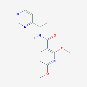 molecular formula C14H16N4O3 B5968393 2,6-dimethoxy-N-[1-(4-pyrimidinyl)ethyl]nicotinamide 