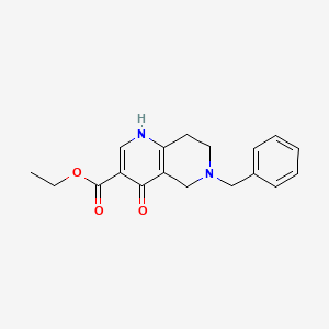 molecular formula C18H20N2O3 B596989 Ethyl 6-benzyl-4-oxo-1,5,7,8-tetrahydro-1,6-naphthyridine-3-carboxylate CAS No. 102200-79-3