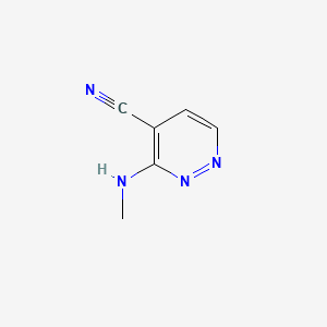 molecular formula C6H6N4 B597031 3-(Methylamino)pyridazine-4-carbonitrile CAS No. 1256268-95-7