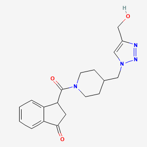 molecular formula C19H22N4O3 B5972952 3-[(4-{[4-(hydroxymethyl)-1H-1,2,3-triazol-1-yl]methyl}-1-piperidinyl)carbonyl]-1-indanone 