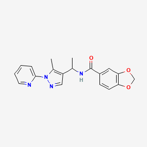 molecular formula C19H18N4O3 B5973977 N-{1-[5-methyl-1-(2-pyridinyl)-1H-pyrazol-4-yl]ethyl}-1,3-benzodioxole-5-carboxamide 