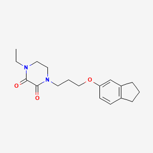 molecular formula C18H24N2O3 B5977972 1-[3-(2,3-dihydro-1H-inden-5-yloxy)propyl]-4-ethyl-2,3-piperazinedione 